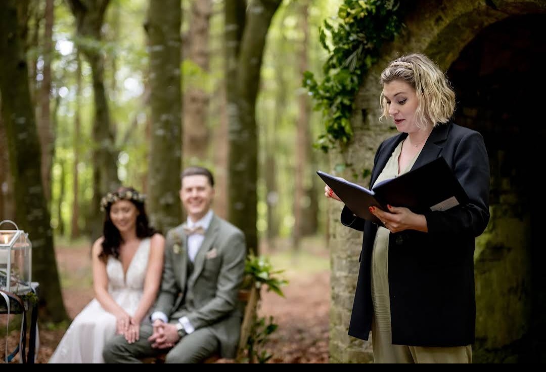 Áine leading a woodland ceremony at Killyon Manor